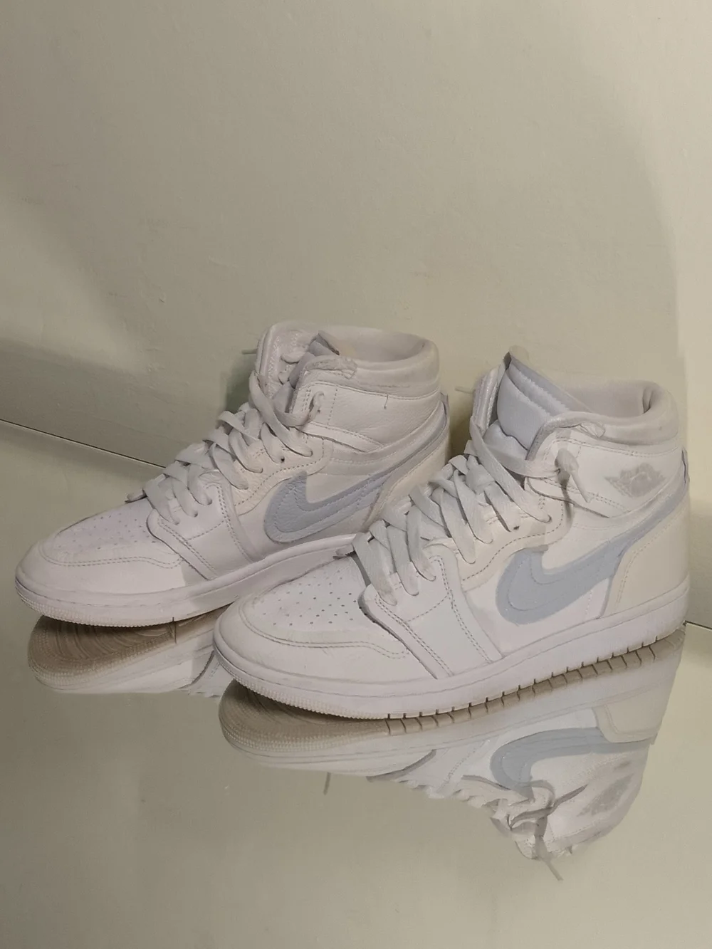 Nike Air Jordans 1 Coconut Milk. Mid-Top Sneakers in White and Light Gray
